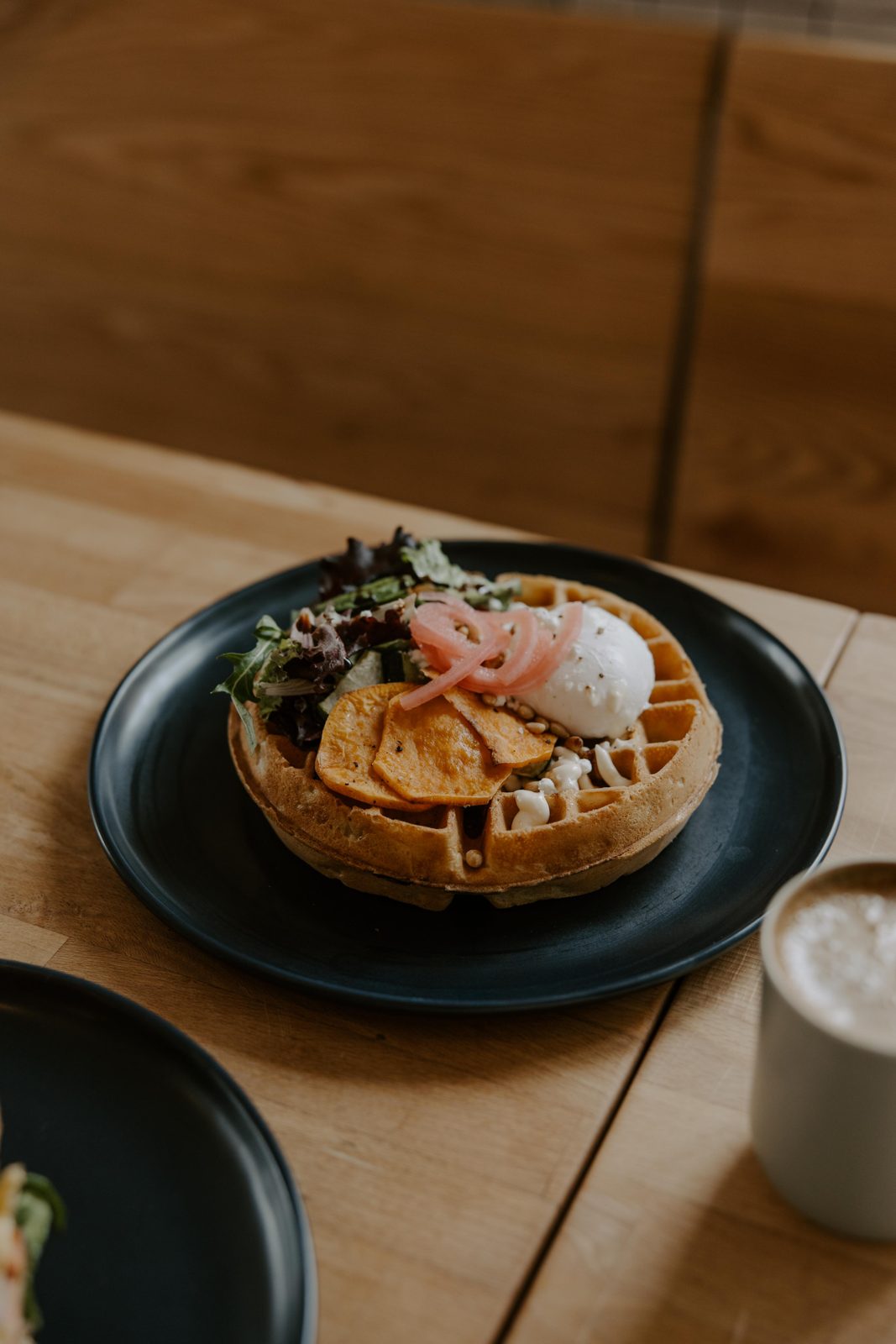Harvest brunch — open-face waffle with sweet potato and poached egg